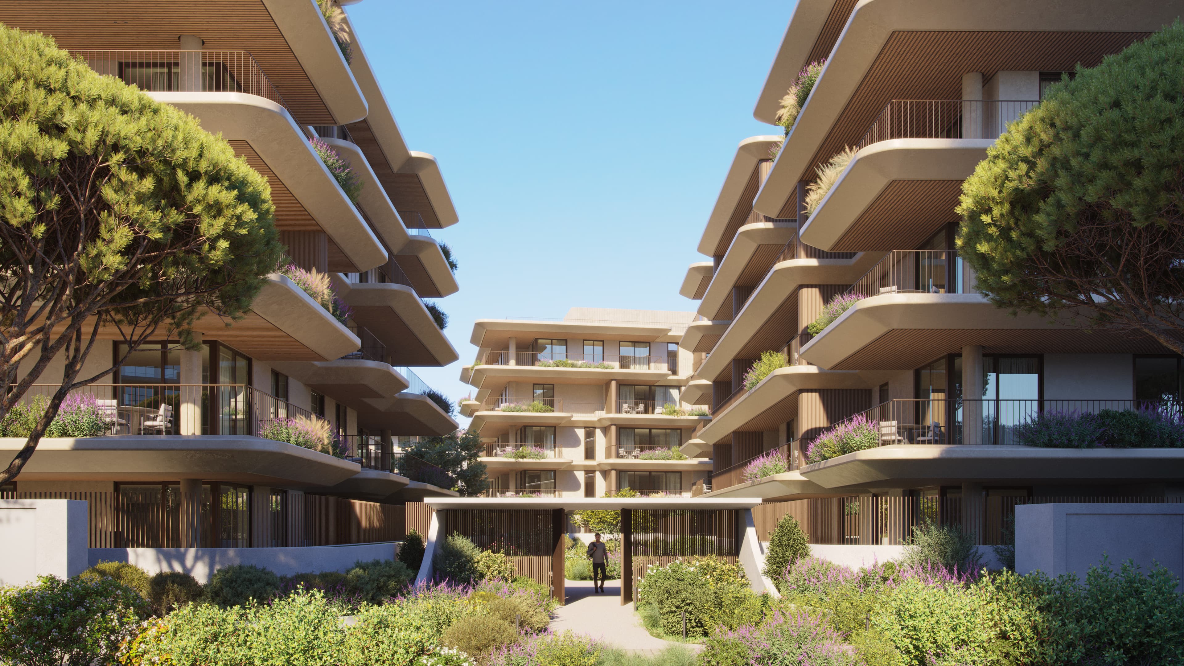 The lush greenery surrounding the buildings