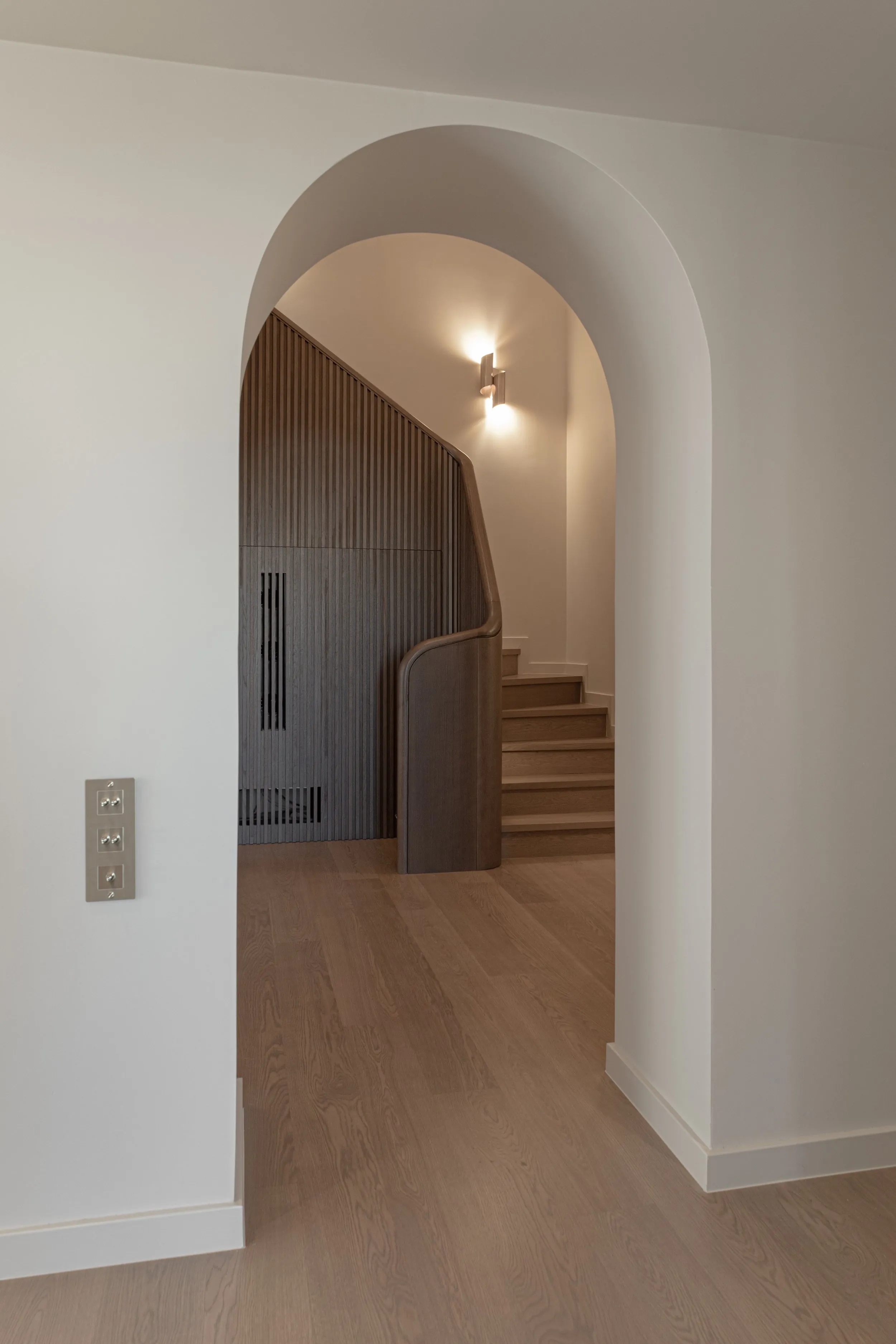 Arched opening to the sculpted staircase