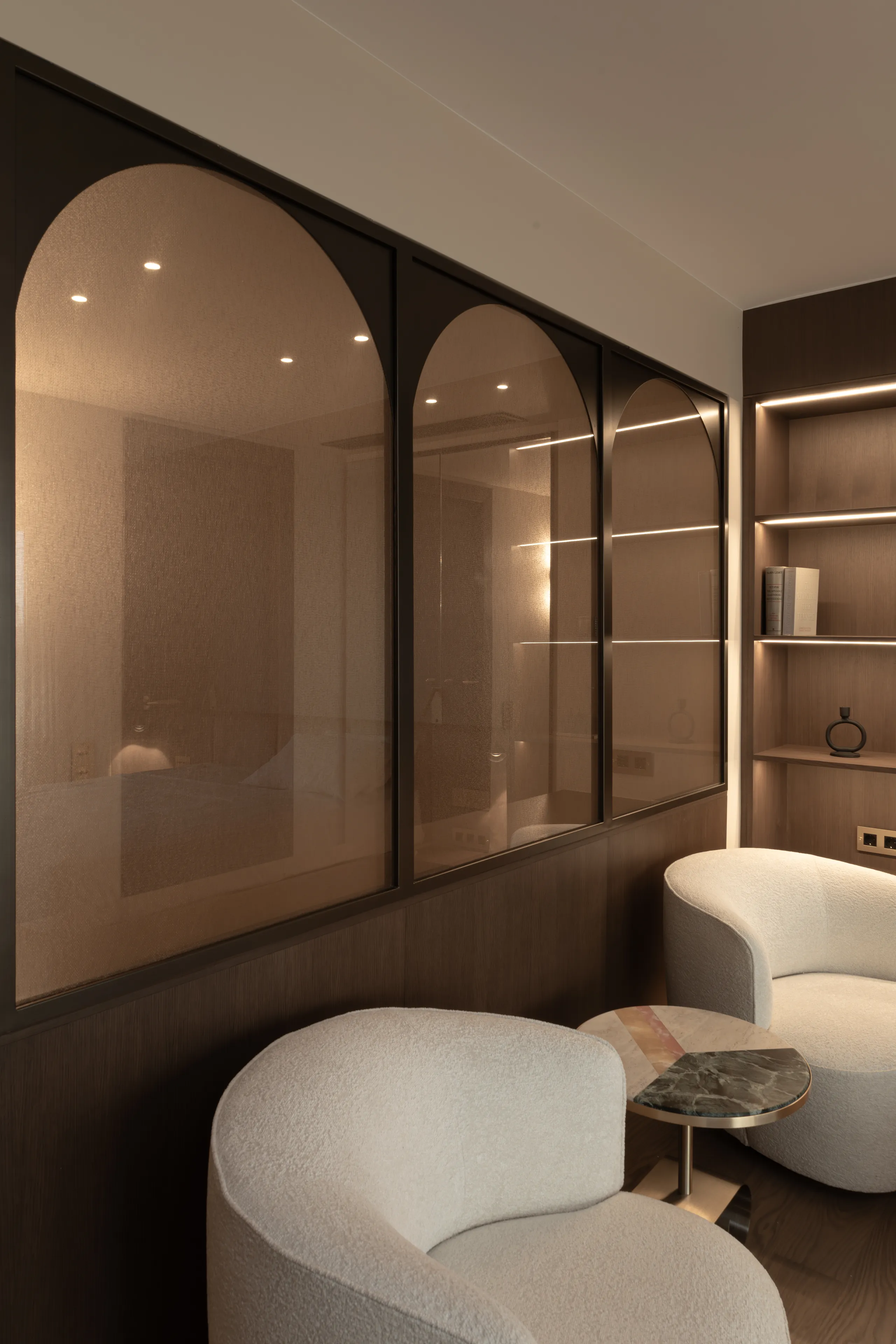 Arched textured glass panels in the lounge