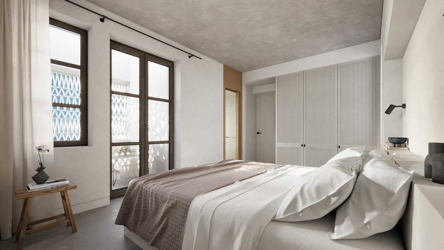 Bedroom with dappled light through the perforated screen