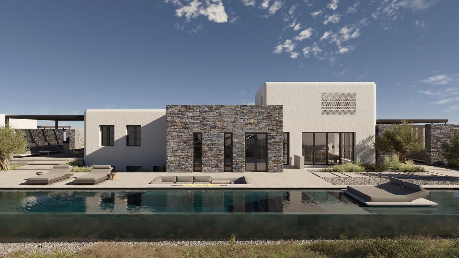 Stone and white facade above the infinity pool