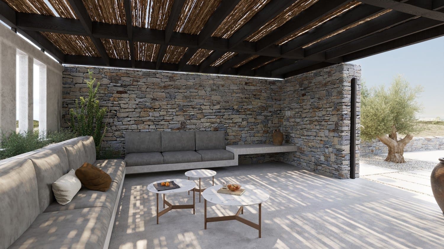 Reed-covered pergola shading the outdoor lounge