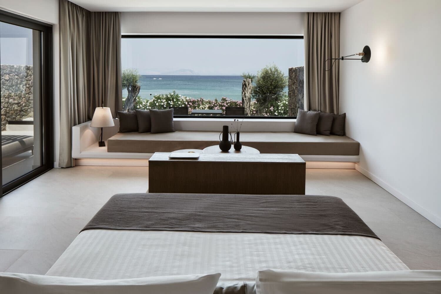 Suite living space framed towards the sea